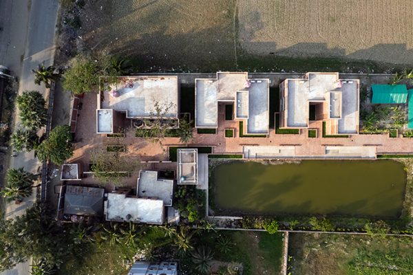 brick walls and perforated jali screens enclose training hub by codec in coastal bangladesh